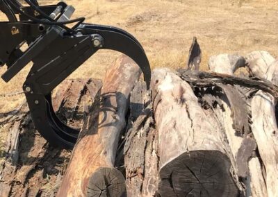 Compact Log Splitter Attachment for residential firewood preparation