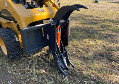 Compact Rock Bucket Attachment for small-scale landscaping